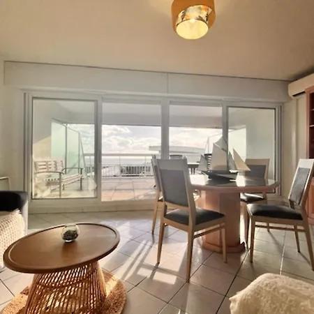 With Sea And Garden View In Apartment